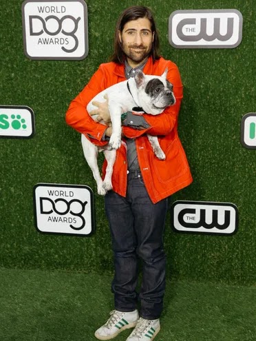 Jason Schwartzman poses with this dog